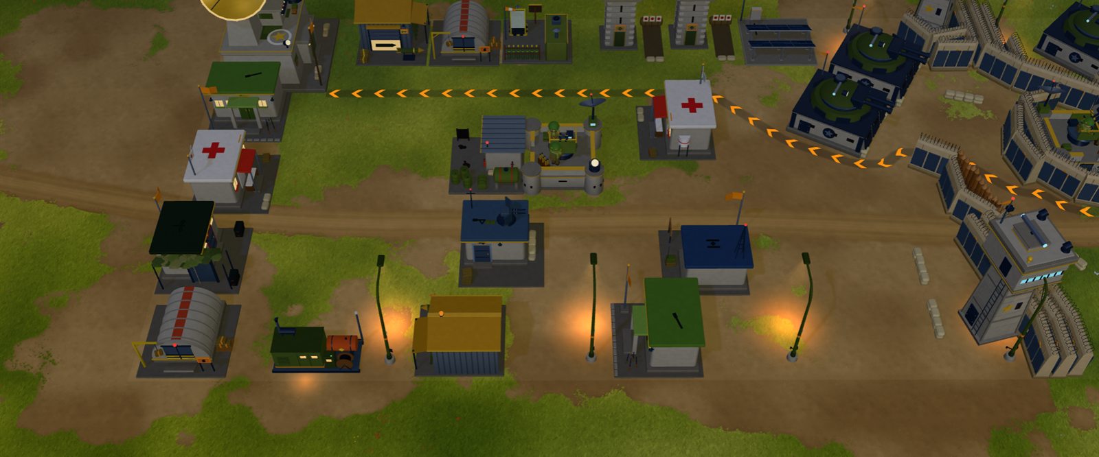 A base at night, its street lamps lit along the road